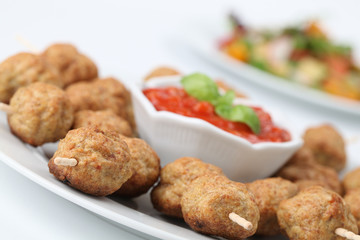 Kebab with tomato sauce