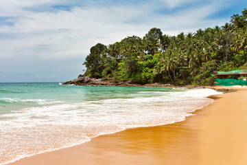 Tropical beach under blue sky. Thailand