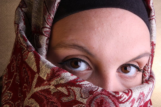 Veiled Woman From The Middle East (golden background)