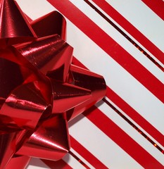 Holiday Wrapping paper with red bow.