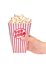 Hand holding a full popcorn box