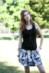 Teen Girl at park looking up and away