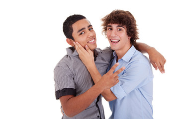two young men  laughing and hugging