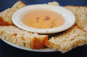 Fresh bread with dipping oil, shallow DOF