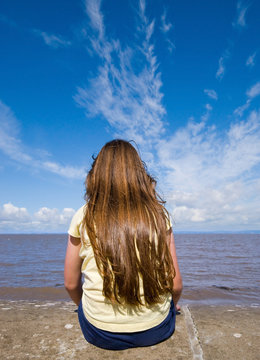 Girl Looking out to Sea