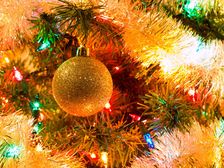 Obraz na płótnie Canvas Christmas Tree Holiday Ornaments Hanging on a Tree