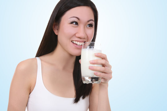 Asian Woman Drinking Milk