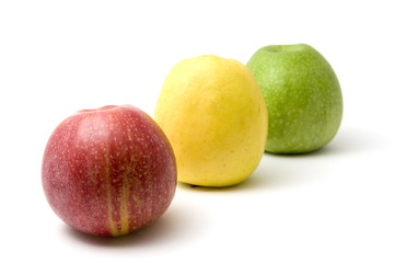 Three apples - red, yellow and green
