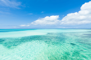 Paradise tropical clear blue water around coral islands