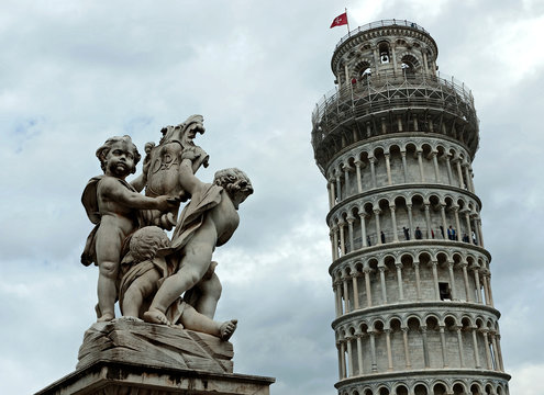 Pisa - angel statue and Leaning Tower