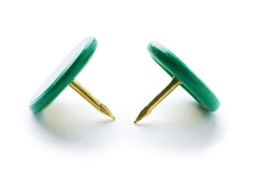 Colourful office pins isolated on the white background