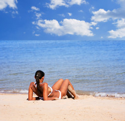 Fototapeta na wymiar attractive woman relax on beach