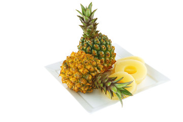 raw pineapples and slices