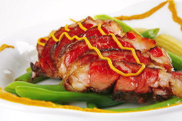 meat served on white with mustard