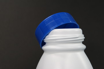 Bottle neck with blue cap