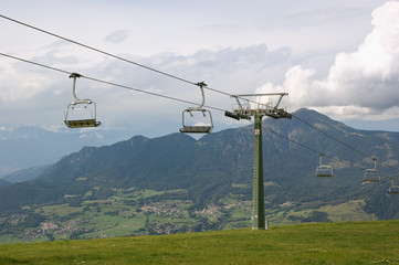 Chair-lift on a cloudy summer day