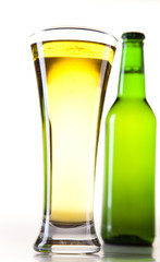 Glass of beer close-up with froth 