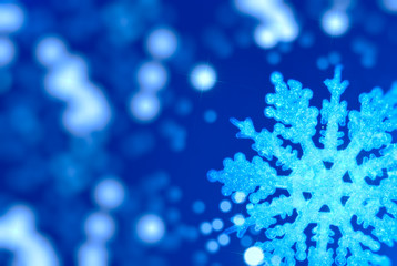 Bright Christmas background with a large snowflake