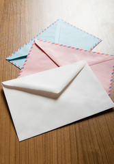 Mail concept with many envelopes on the table