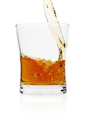 Pouring whiskey in glass