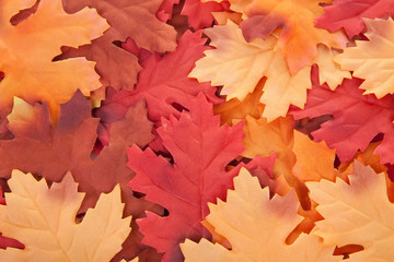 background of silk autumn leaves