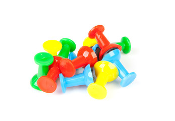 colorful magnets over white background