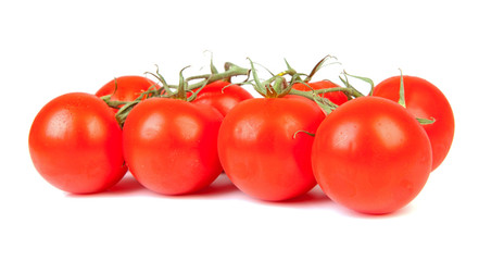 bunch of fresh tomatoes over white background