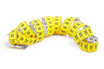 yellow measure tape over white background