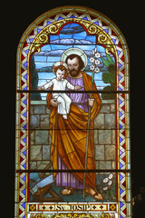 Saint Joseph holding baby Jesus