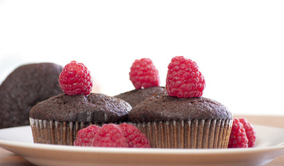 brown muffins with raspberry