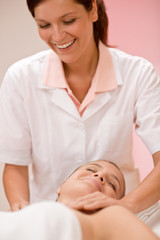 Fototapeta na wymiar Luxury care - woman at cleavage massage