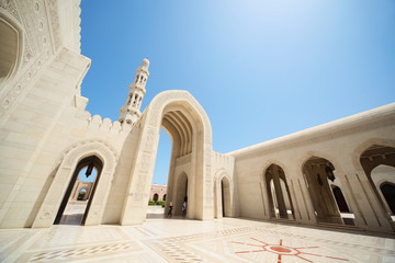 Fototapeta na wymiar beautiful architecture inside Grand Mosque in Oman. arcs, tower.