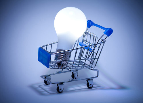 Buy the Light. Shopping cart with light bulb.