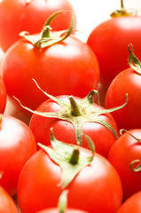 Red tomatoes arranged at the market stand