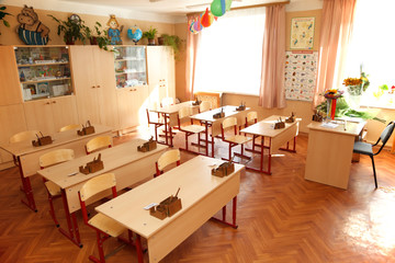 Empty classroom ready for lessons. Interior school.