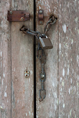 Old chain and padlock vertical