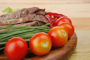 beef on wooden plate