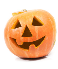 Creepy carved pumpkin face, with a smile