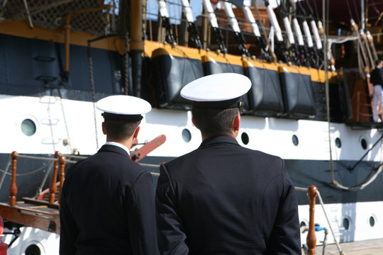 Two Sailors in Uniform