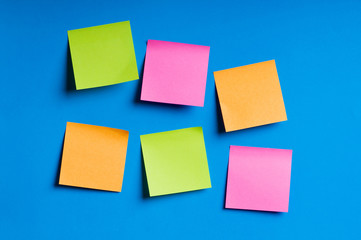 Reminder notes on the bright colorful paper