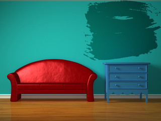 Red sofa with blue bedside table and splash in kids room