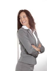 Businesswoman doing expressions on white background