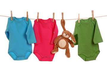 Colorful baby goods hanging on the clothesline