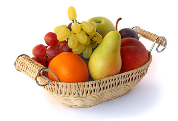 Fruit in a wicker basket on a white background