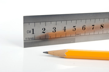 steel ruler with pencil
