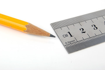 steel ruler with pencil