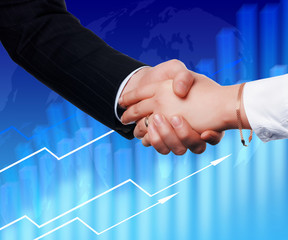 Handshake on an abstract background.