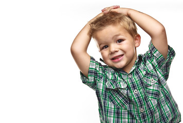Cute little boy smiling for the viewer