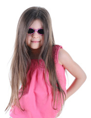 Fototapeta premium Portrait little long-haired brunette in sunglasses