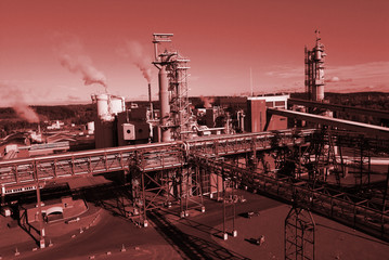 Fototapeta na wymiar Industrial zone, Steel pipelines in red tones